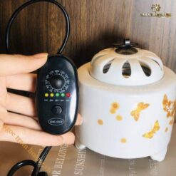 Lư xông điện trầm hương hoa mai vàng