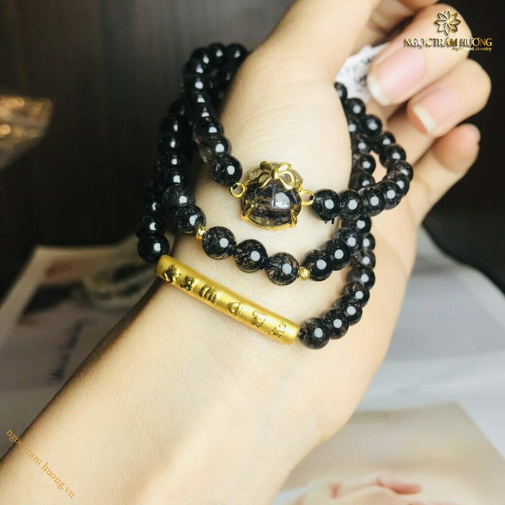 Vòng tay đá thạch anh tóc đen 6li mix charm vàng tài lộc