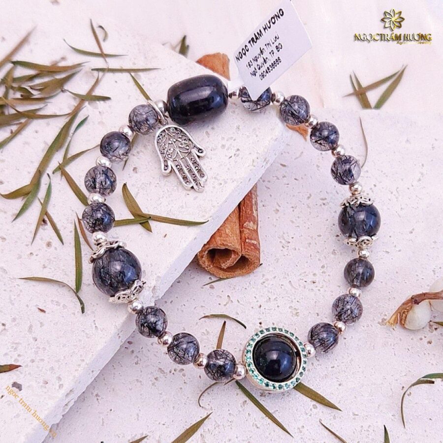 Vòng tay đá thạch anh tóc đen mix charm bạc tài lộc